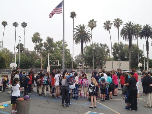 Monday morning prayer & flag salute circle.