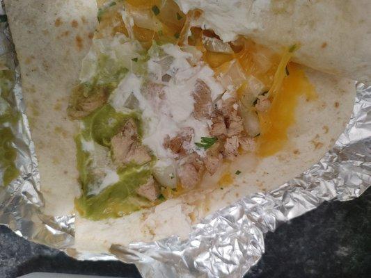 The quesadilla was more.of an avocado and sour cream quesadilla with a pinch of chicken