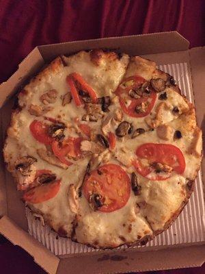 Not much chicken, and certainly almost no mushrooms. The pizza lacks anything that remotely resembles effort.