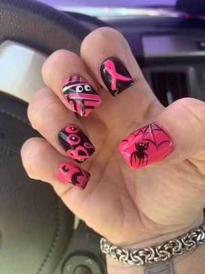 Breast cancer Halloween nails by Jackie.