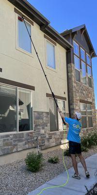 Waterfed pole and pure water are used to maintain the windows and keep them squeaky clean.