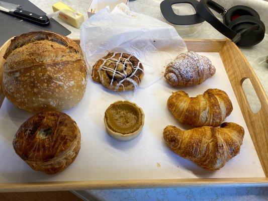 Fresh baked Country bread, meat pie, cinnamon bun, pumpkin pie, raspberry n chocolate croissant, and 2 croissants