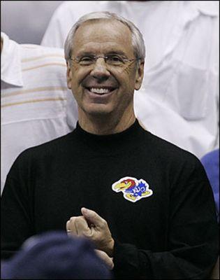 Roy Williams with a KU sticker on his shirt, rooting the Jayhawks on in the 2008 national championship 2 days after KU eliminated UNC.