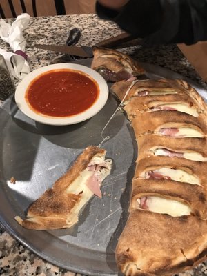 Medium Ham and Cheese Calzone with Marinara.