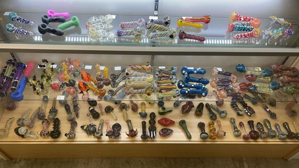 Variety of out hand pipes, each blown different from the next