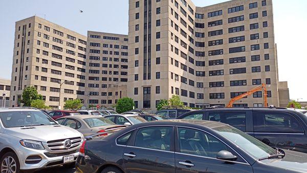 A view looking to the hospital building from the parking lot