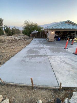 Driveway extension where tree was and added all the way to the gate