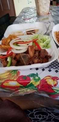 Griot and red beans and rice. Delicious and freshly made.