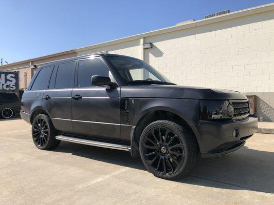 Autobiography style Range Rover using Elite Jumbo Camo with gloss black top.