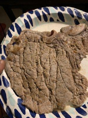 T-bone steak that's grey, steamed and not seasoned. It's so thin and nasty the texture is off