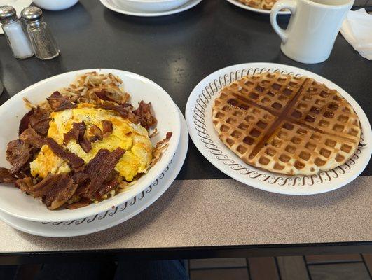 Bacon, egg & cheese hashbrown bowl with extra bacon. Waffle with syrup.