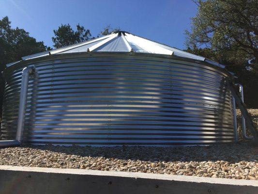 Corrugated metal liner tanks with conical roofs