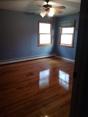 Bedroom painting and stained floor