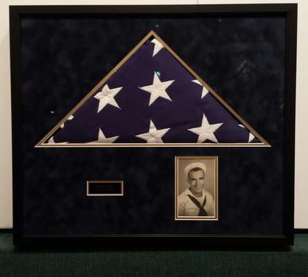 WWII Navy seaman memorial flag frame.