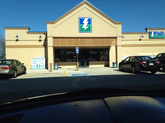 Flash foods store front. A gas station with convenience store.