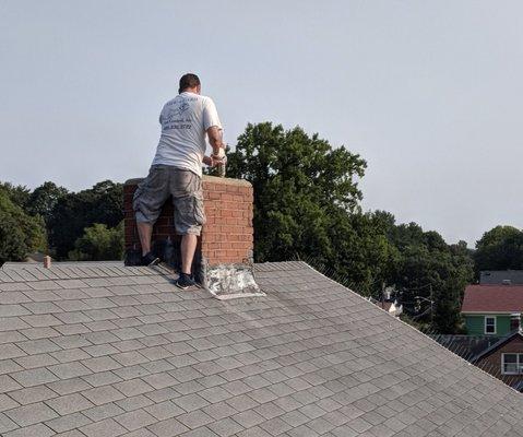 Treatment for wasps in a customer's chimney.