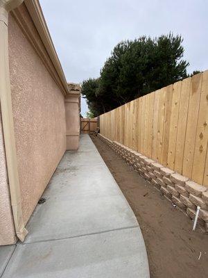 Concrete Walkway on side of house and nee retaining wall