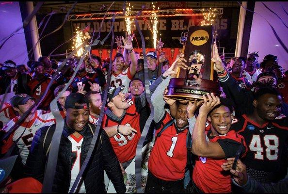 Valdosta State football celebrating their Division championship with streamers, Confetti, cold sparklers, CO2 cryo-jets and more