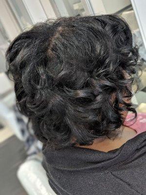 Trim and silk press on natural hair