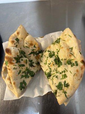 Cilantro Naan
Freshly clay oven baked bread with cilantro.