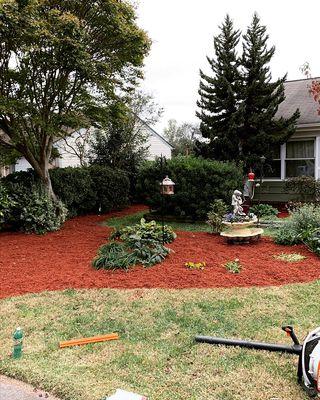 Mulch and flower bed work.