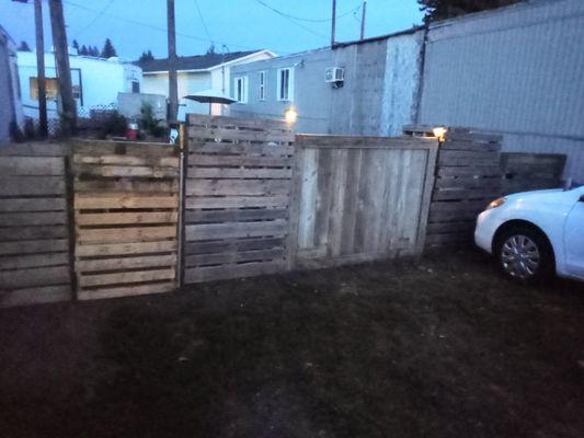 Here I built a fence out of pallets. Complete with a gate to walk through and a gate to drive threw.