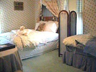 This is the Elizabeth Room. It features a Queen Sized bed and also has a Twin Sized bed in the room.