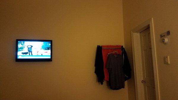 Clothing rack with TV.