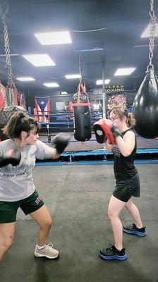 Learning the boxing moves.