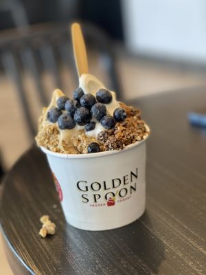 1/2 vanilla 1/2 salted caramel, granola, almond roca and bluberries!