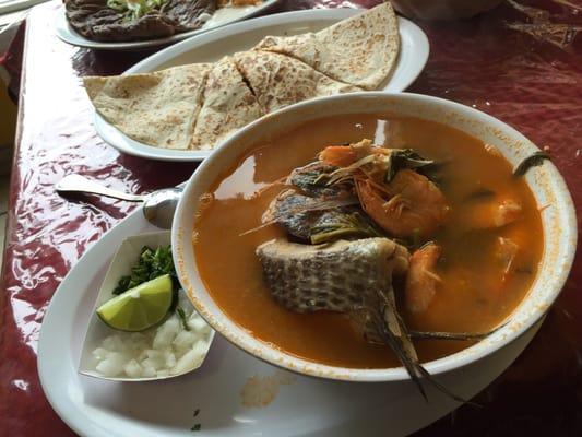 Caldo pescado and chicken quesadilla