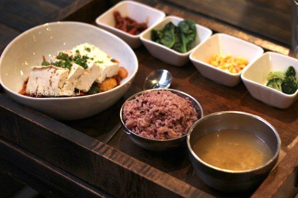 Tofu Kimchi And Pork ($20.99) - stir-fried kimchi and marinated pork in gochujang sauce. Served w steamed tofu slices.