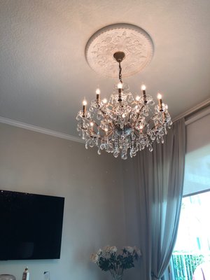 One of 2 chandeliers installed along with 3 Flatscreen TVs