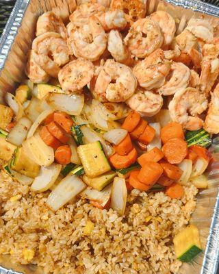 Triple shrimp tray with grilled vegetables and fried rice.
Trays are available for pick or 15% delivery charge.