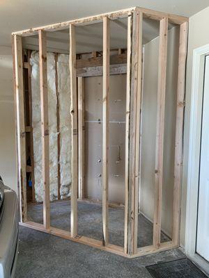 Pantry wall being placed in garage