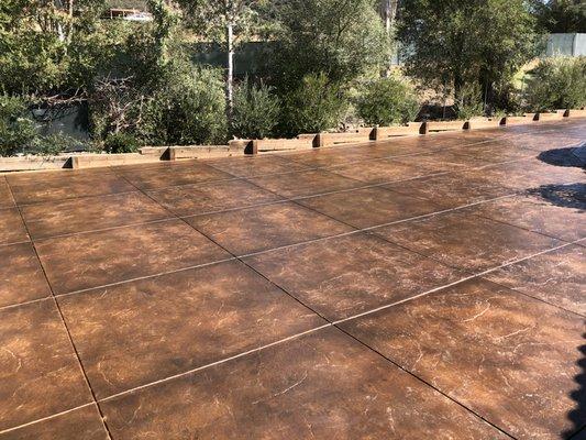 Stamped stained concrete driveway