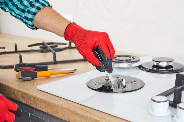 repairing a broken stove top