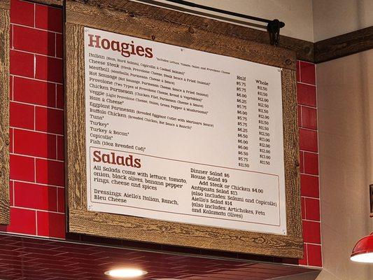 Hoagies/Salads Menu above counter.