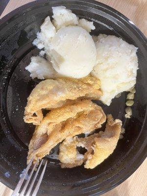 Mash potatoes and perch