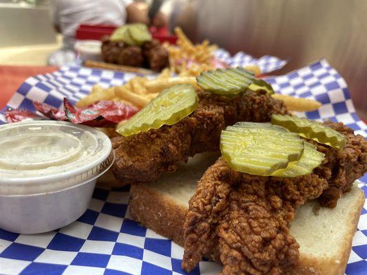 Jumbo Tenders. 2 piece tenders on white bread with pickles and fries