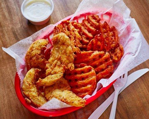 Crispy chicken tenders and sweet potato fries