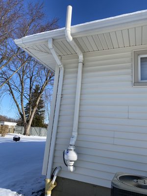 Outside view of radon mitigation system.