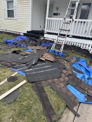 Old shingles being removed