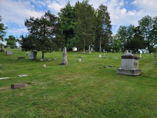 The vast layout of the cemetery and  Beautiful architecture and plantings.