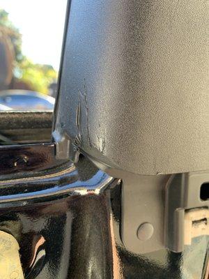 See how they used some metal piece to pop off the panel leaving deep scratch marks. Both the drivers side and passenger side are like this.