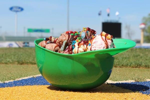 Try The Walk-Off - 22 scoops of ice cream in one helmet, topped with chocolate syrup and candy.