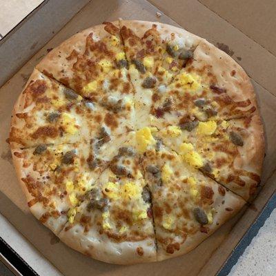 Breakfast pizza is so good! Some of the best breakfast pizza I've ever eaten!