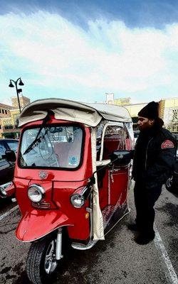 Checking out the tuk making sure its safe for its next tour!