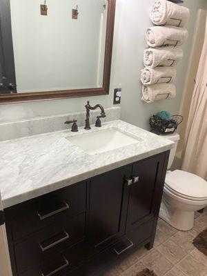 Installed new vanity, counter and faucets