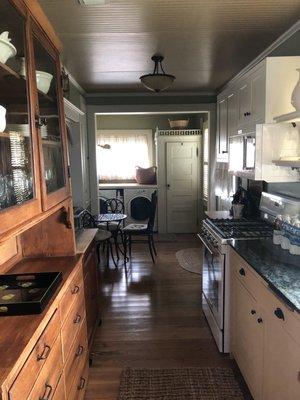 Galley kitchen~ washer/dryer at the end